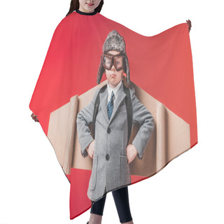 Personality  Upset Boy In Suit With Plane Wings And Protective Eyeglasses Isolated On Red Hair Cutting Cape