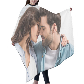 Personality  Portrait Of Beautiful Couple Tenderly Embracing At Home  Hair Cutting Cape