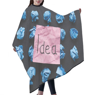 Personality  Top View Of 'idea' Word Written On Sticky Note With Blue Crumpled Paper Balls On Black Background, Ideas Concept Hair Cutting Cape