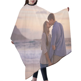 Personality  Every Kiss Feels Like Our First. Shot Of A Young Couple Enjoying A Romantic Kiss On The Beach At Sunset. Hair Cutting Cape