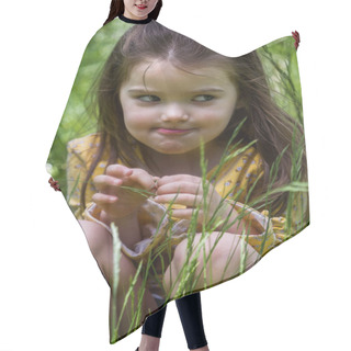 Personality  Portrait Of A Happy Four Year Old Little Girl Sitting In Green Grass Hair Cutting Cape