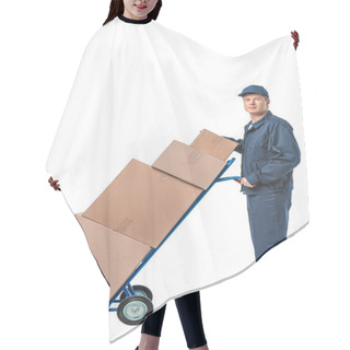 Personality  Handsome Mover In Uniform Looking At Camera While Transporting Cardboard Boxes On Hand Truck Isolated On White Hair Cutting Cape