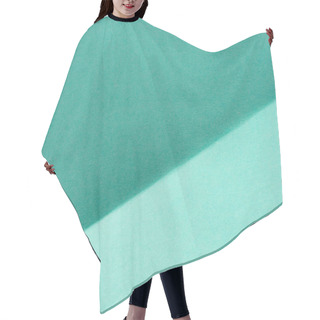 Personality  Close-up Shot Of Turquoise Color Folded Paper For Background Hair Cutting Cape