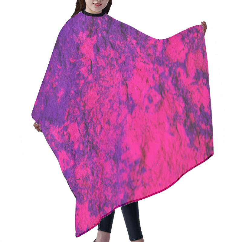 Personality  top view of purple and pink holi powder, traditional Indian festival of colours hair cutting cape