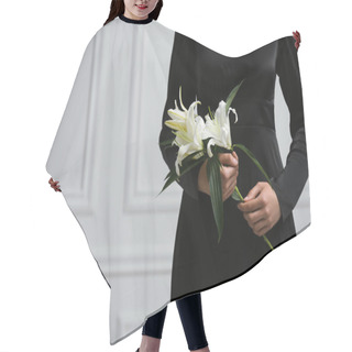 Personality  Woman With Lilies Near White Wall, Closeup And Space For Text. Funeral Ceremony Hair Cutting Cape