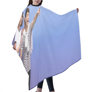 Personality  Panoramic Shot Of Excited Man Looking Away And Pointing With Finger Near Smiling Girlfriend On Blue Background Hair Cutting Cape