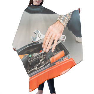 Personality  Cropped Image Of Plumber Taking Adjustable Wrench From Toolbox In Kitchen Hair Cutting Cape