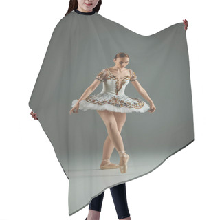 Personality  A Young, Beautiful Ballerina Gracefully Strikes A Pose In A White Tutu. Hair Cutting Cape