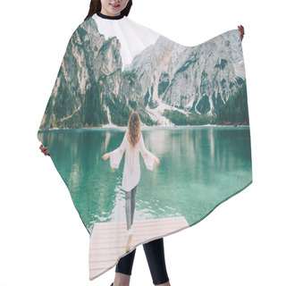 Personality  Romantic Girl With Long Hair Loose, Turned Away, Walk Spread Hands On Wooden Pier Lake Braies. Tourist Enjoy Mysterious Nature Amazing Alpine Mountains With Green Forest Clear Water Silence Relaxation Hair Cutting Cape