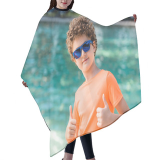 Personality  Curly Boy In Blue Sunglasses And Orange T-shirt Showing Thumbs Up Near Pool Hair Cutting Cape