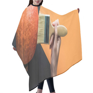Personality  Panoramic Shot Of Woman Holding Paintbrush Near Pumpkin On Black And Orange Background Hair Cutting Cape