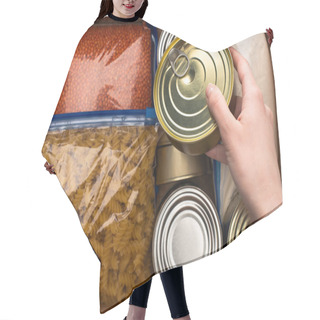 Personality  Cropped View Of Woman Holding  Tin Above Cereals In Zipper Bags, Food Donation Concept Hair Cutting Cape