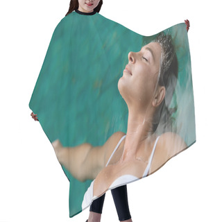Personality  Young Woman Floating In Water While In A Swimming Pool On Vacation. Hair Cutting Cape