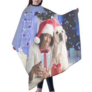 Personality  Joyful African American Girl Holding Gift Box While Lying On Floor Near Labrador On Blurred Background Hair Cutting Cape