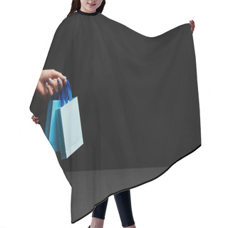 Personality  Partial View Of Woman Holding Blue Paper Shopping Bags On Black Background Hair Cutting Cape