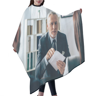 Personality  Mature Investor Holding Envelope Near Business People On Blurred Foreground In Office  Hair Cutting Cape
