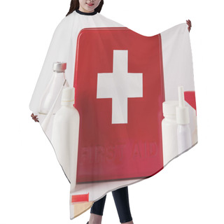 Personality  Close-up Shot Of First Aid Kit Box With Various Medical Supplies On White Hair Cutting Cape
