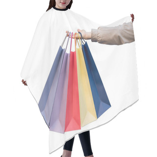 Personality  Five Colored Bags For Shopping In A Female Hand. Close-up, Isolate. Shopping Hair Cutting Cape