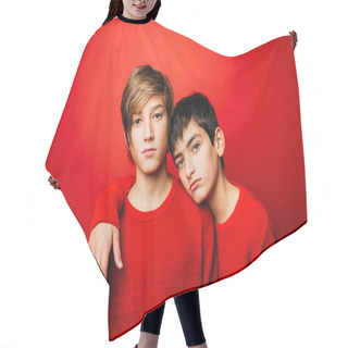 Personality  Two Pre-adolescent Boys, Wearing A Red Sweater, Embracing Over A Red Background Hair Cutting Cape