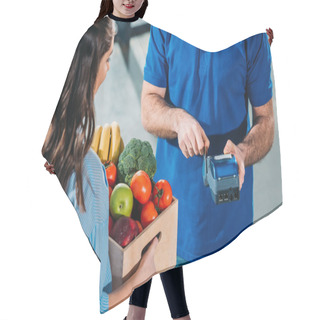 Personality  Courier Adjusting Payment Terminal While Woman Holding Groceries In Box Hair Cutting Cape