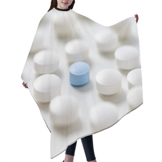 Personality  White Pills  With Ablue One  In The Middle On  White Backgroung Hair Cutting Cape