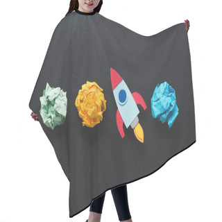 Personality  Top View Of Cardboard Rocket With Crumpled Paper Balls On Black Background, Setting Goals Concept Hair Cutting Cape