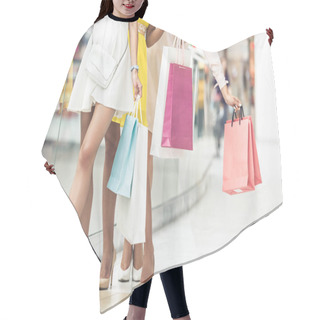 Personality  Low Section Of Stylish Young Women Holding Shopping Bags Hair Cutting Cape