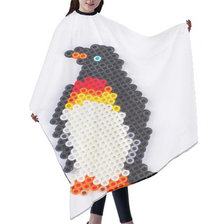 Personality  Penguin Perler Beads. Close Up. White Isolated Background. Hair Cutting Cape