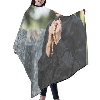 Personality  Cropped View Of Woman Holding Rosary Beads On Graveyard  Hair Cutting Cape