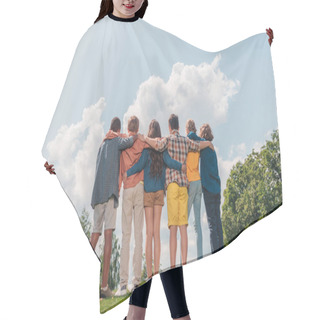 Personality  Back View Of Happy Kids Standing And Hugging In Park  Hair Cutting Cape