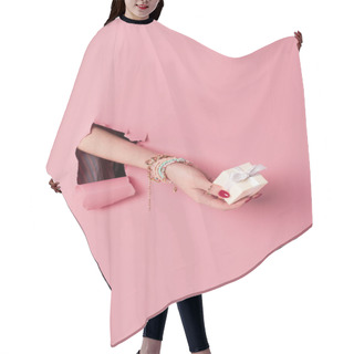 Personality  Cropped View Of Young Woman Holding Present Pink Background With Hole  Hair Cutting Cape