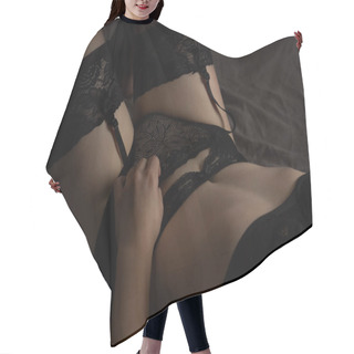 Personality  A Girl In Black Underwear With Suspenders Lies On Her Back. Hair Cutting Cape