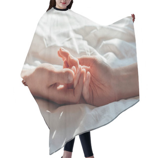 Personality  Partial View Of Couple In Live Holding Hads While Lying In Bed Together Hair Cutting Cape