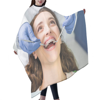 Personality  Cropped View Of Dentist In Latex Gloves Examining Cheerful Woman In Braces With Opened Mouth  Hair Cutting Cape