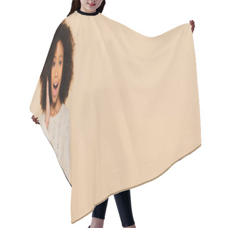Personality  Excited African American Preteen Girl With Hand Near Face Holding Smartphone Isolated On Beige, Banner Hair Cutting Cape