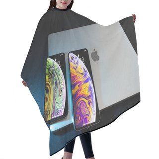 Personality  PARIS, FRANCE - SEP 25, 2018: Two New IPhone Xs And Xs Max Smartphone Model By Apple Computers Close Up On Laptop MacBook Pro Closed Lid. Newest Golden Apple IPhone 11 Mobile Phone Device  Hair Cutting Cape