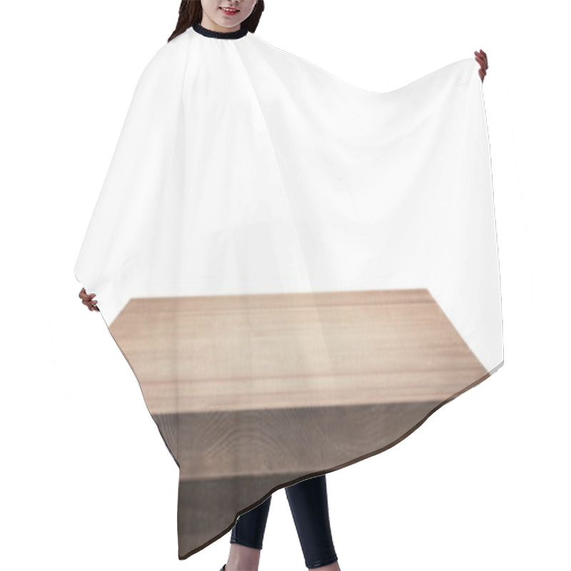 Personality  Wooden table top on  background. hair cutting cape