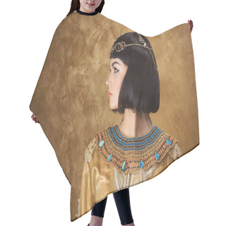 Personality  Beautiful Woman Like Egyptian Queen Cleopatra On Golden Background. Side View, Face Profile Hair Cutting Cape