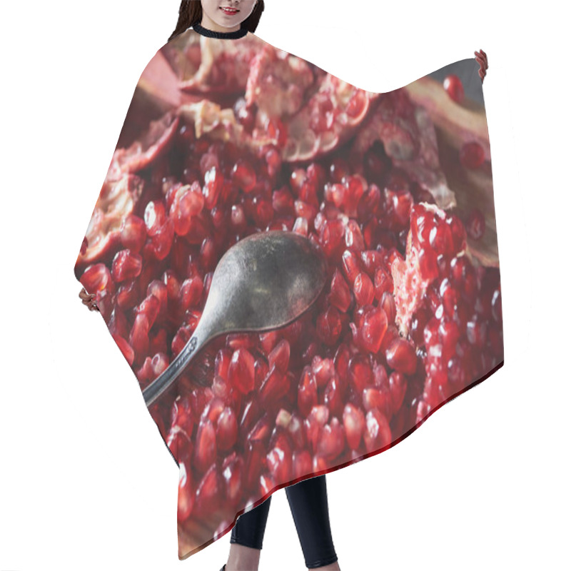 Personality  Close Up Shot Of Silver Spoon With Garnet Seeds Hair Cutting Cape