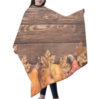 Personality  Top View Of Small Ripe Pumpkins On Brown Wooden Surface With Dry Autumn Leaves Hair Cutting Cape
