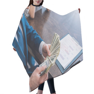 Personality  Cropped View Of Collector Holding Dollar Banknotes Near Woman At Table With Pen And Documents  Hair Cutting Cape