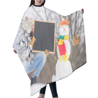 Personality  Winter Holidays. Upcoming Event. Man With Beard Hold Chalkboard Copy Space. Winter Announcement. Hipster Knitted Hat And Gloves Show Blackboard. Guy And Snowman Snowy Nature Background. Winter Event Hair Cutting Cape