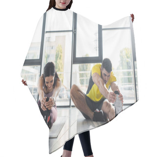 Personality  Sportsman And Sportswoman Stretching On Fitness Mats In Sports Center Hair Cutting Cape
