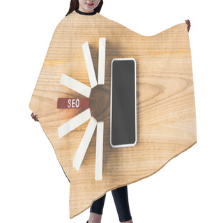Personality  Top View Of Wooden Rectangles With Lettering Seo And Smartphone With Copy Space On Table  Hair Cutting Cape