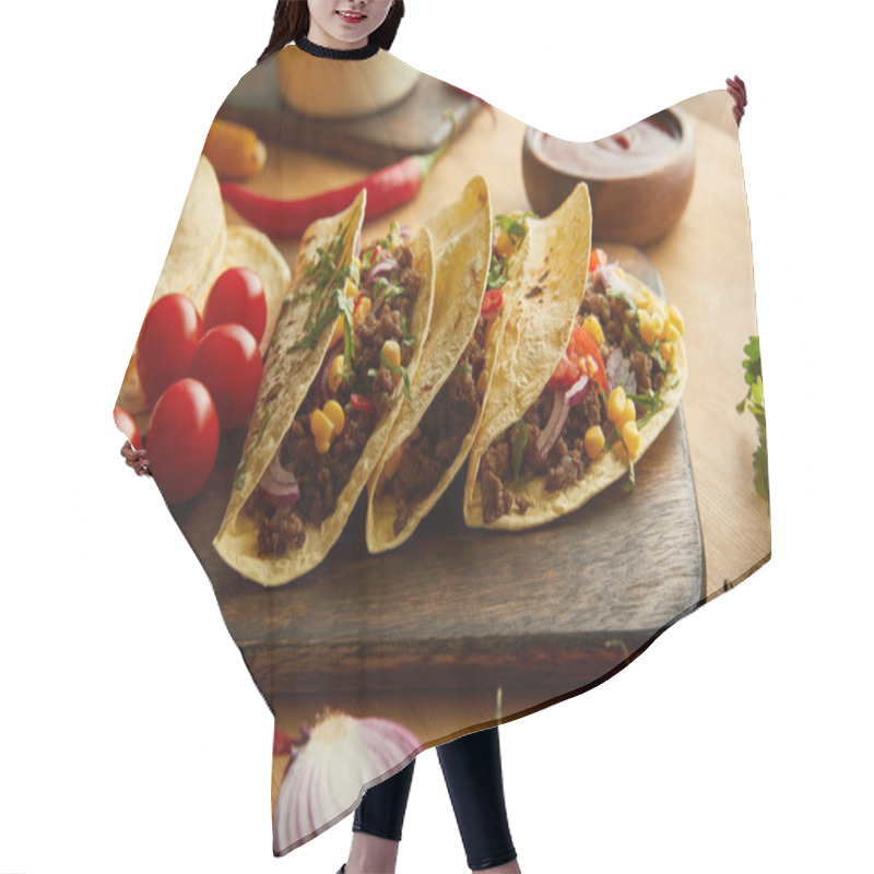 Personality  Fresh tacos with minced meat and vegetables on wooden table hair cutting cape