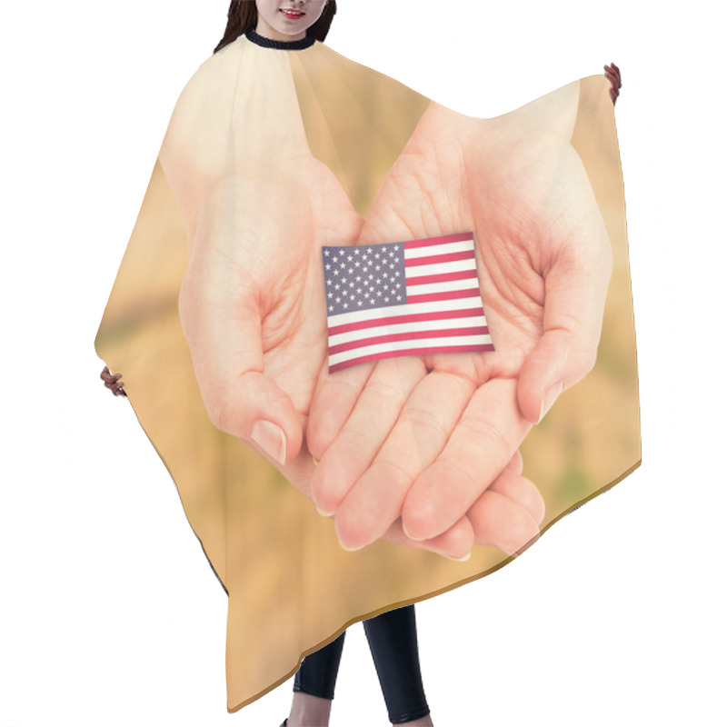 Personality  hands showing usa national flag hair cutting cape