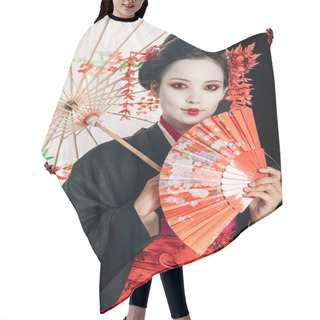 Personality  Smiling Beautiful Geisha In Black Kimono With Red Flowers In Hair Holding Traditional Asian Umbrella And Hand Fan Isolated On Black Hair Cutting Cape