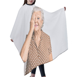 Personality  Senior Grey-haired Woman Wearing Casual Clothes Covering One Eye With Hand, Confident Smile On Face And Surprise Emotion.  Hair Cutting Cape