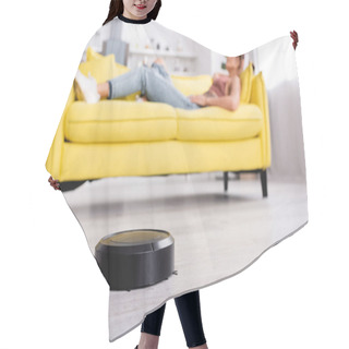 Personality  Selective Focus Of Robotic Vacuum Cleaner On Floor Hair Cutting Cape