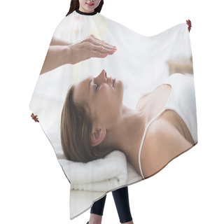 Personality  Therapist Performing Reiki On Woman Hair Cutting Cape